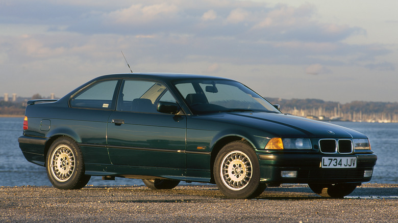 BMW E36 318is parked by the water