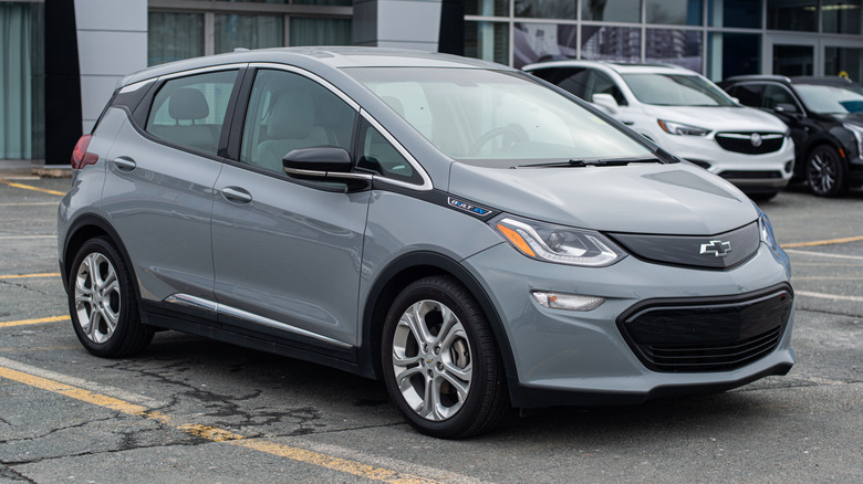 A grey Chevrolet Bolt EV parked in a parking lot