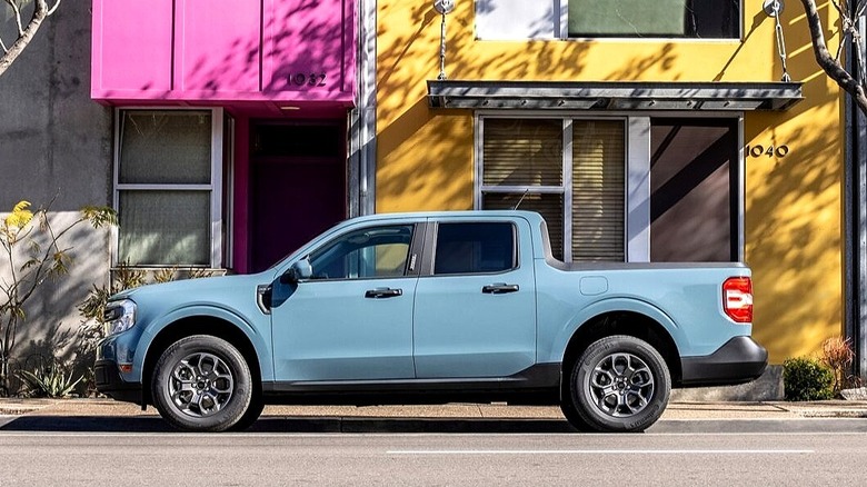 A blue 2022 Ford Maverick parked on a street.