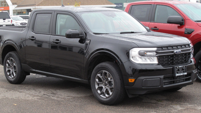 A parked black 2022 Ford Maverick XLT.