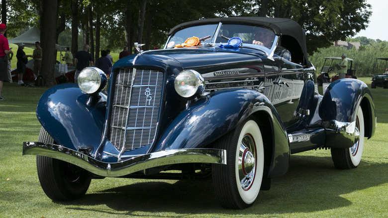 A stunning twice-ribboned 1935 Auburn 851 Speedster on the green lawn of Concours d'Elegance of America.