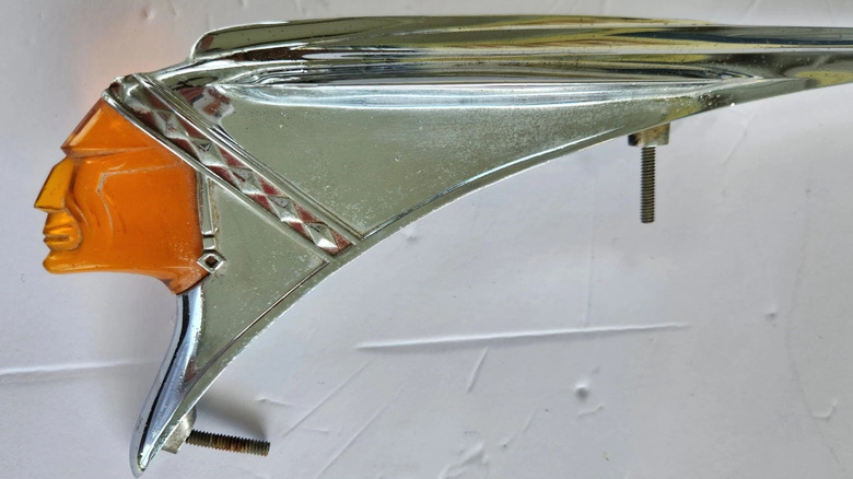 The Pontiac Chief hood ornament on a white background from an eBay sales listing.