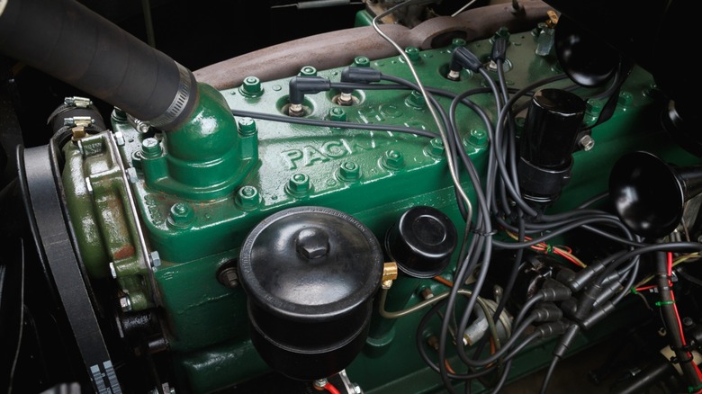 A green Packard Super 8 160 series inline-eight engine