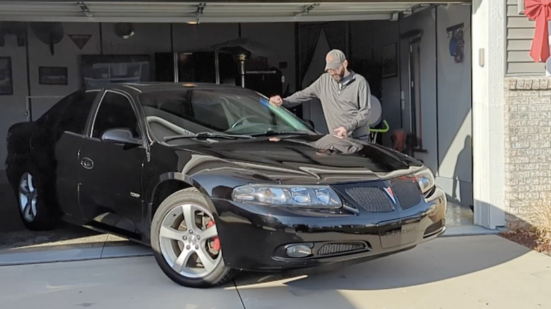 Black 05 Bonneville GXP parked in a garage