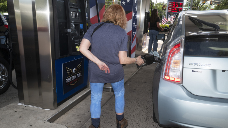 A customer pumps gas into their Toyota Prius at a Freedom Fuel Network gas station on July 8, 2026 in Dresher, Pennsylvania