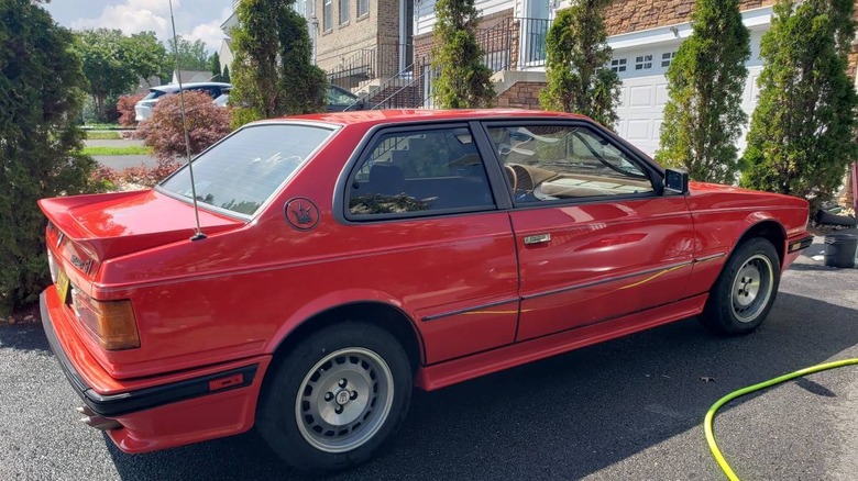 1987 Maserati Biturbo Si passenger side in a driveway image