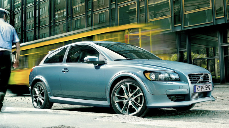 A Volvo C30 parked on a city street