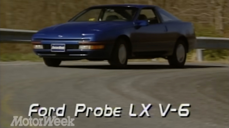 Blue ford probe on a road