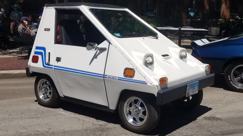 The front-quarter shot of a white Vanguard Citicar
