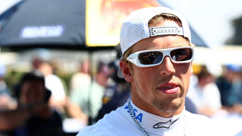 Liam Lawson in sunglasses at Goodwood