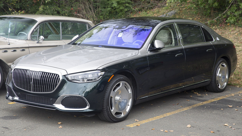 A front-left 3/4 view of a 2021 Mercedes-Maybach S580 parked in a parking lot