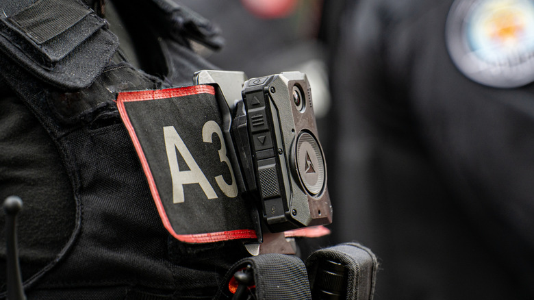 Close-up of a police officer wearing a body camera